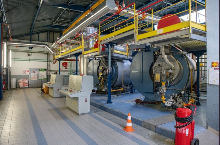 Commercial boiler maintenance London engineer inspecting heating system